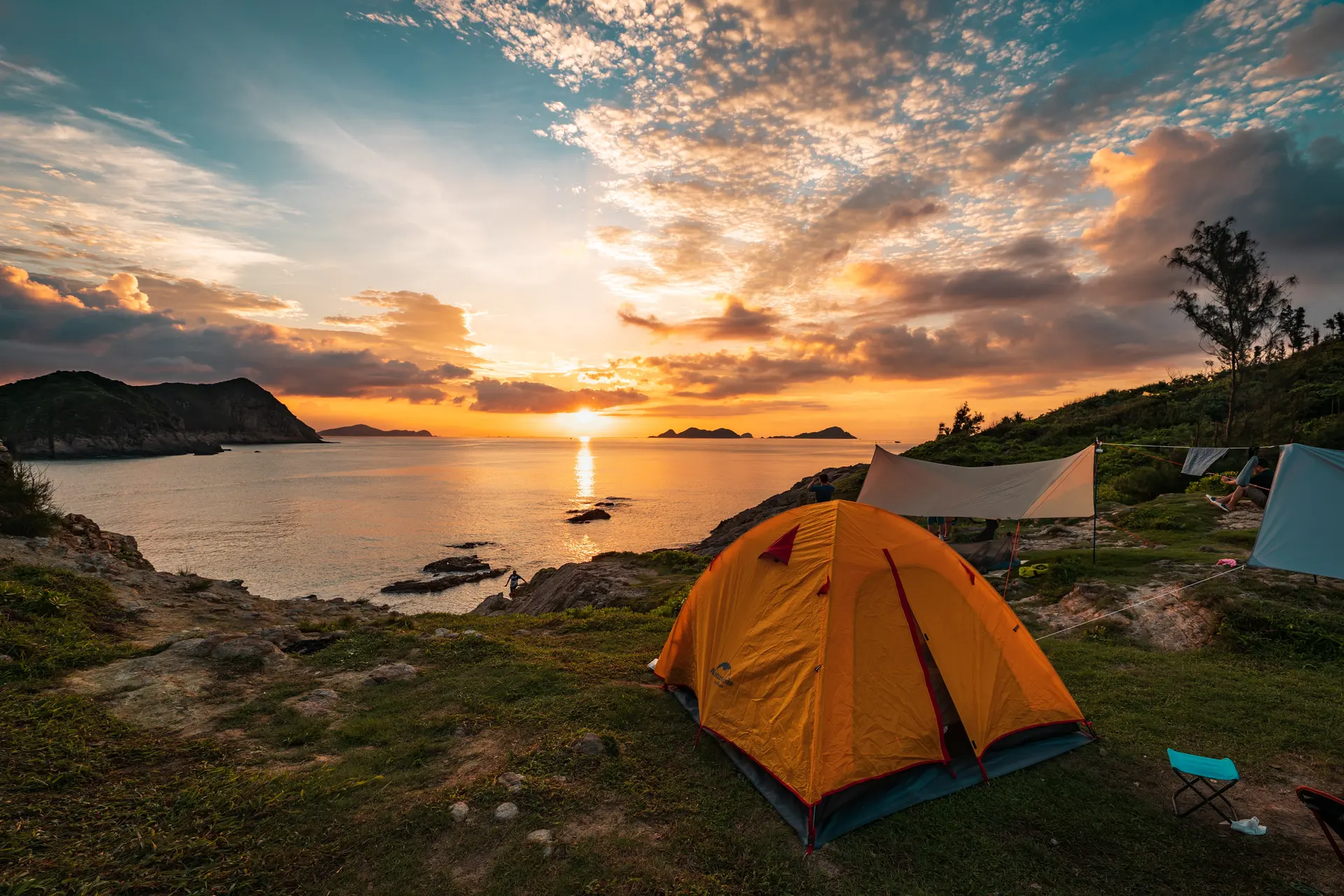Coastal camping at sunset